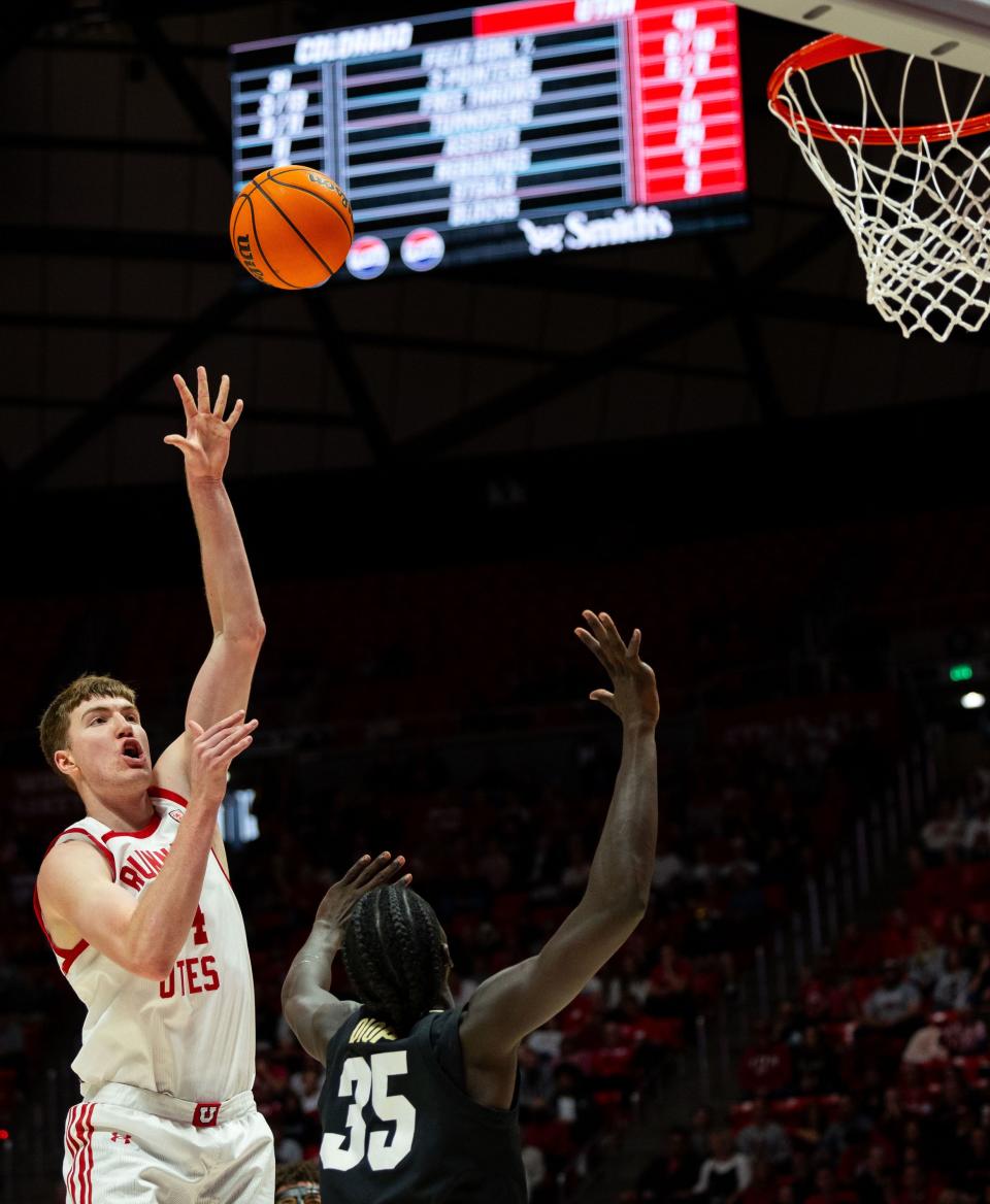 Utah Utes center Lawson Lovering (34) shoots the ball with Colorado Buffaloes forward Assane Diop (35) on defense during the men’s college basketball game between the Utah Utes and the Colorado Buffaloes at the Jon M. Huntsman Center in Salt Lake City on Saturday, Feb. 3, 2024. | Megan Nielsen, Deseret News