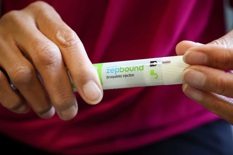 An injection pen of Zepbound, Eli Lilly’s weight loss drug, is displayed in New York