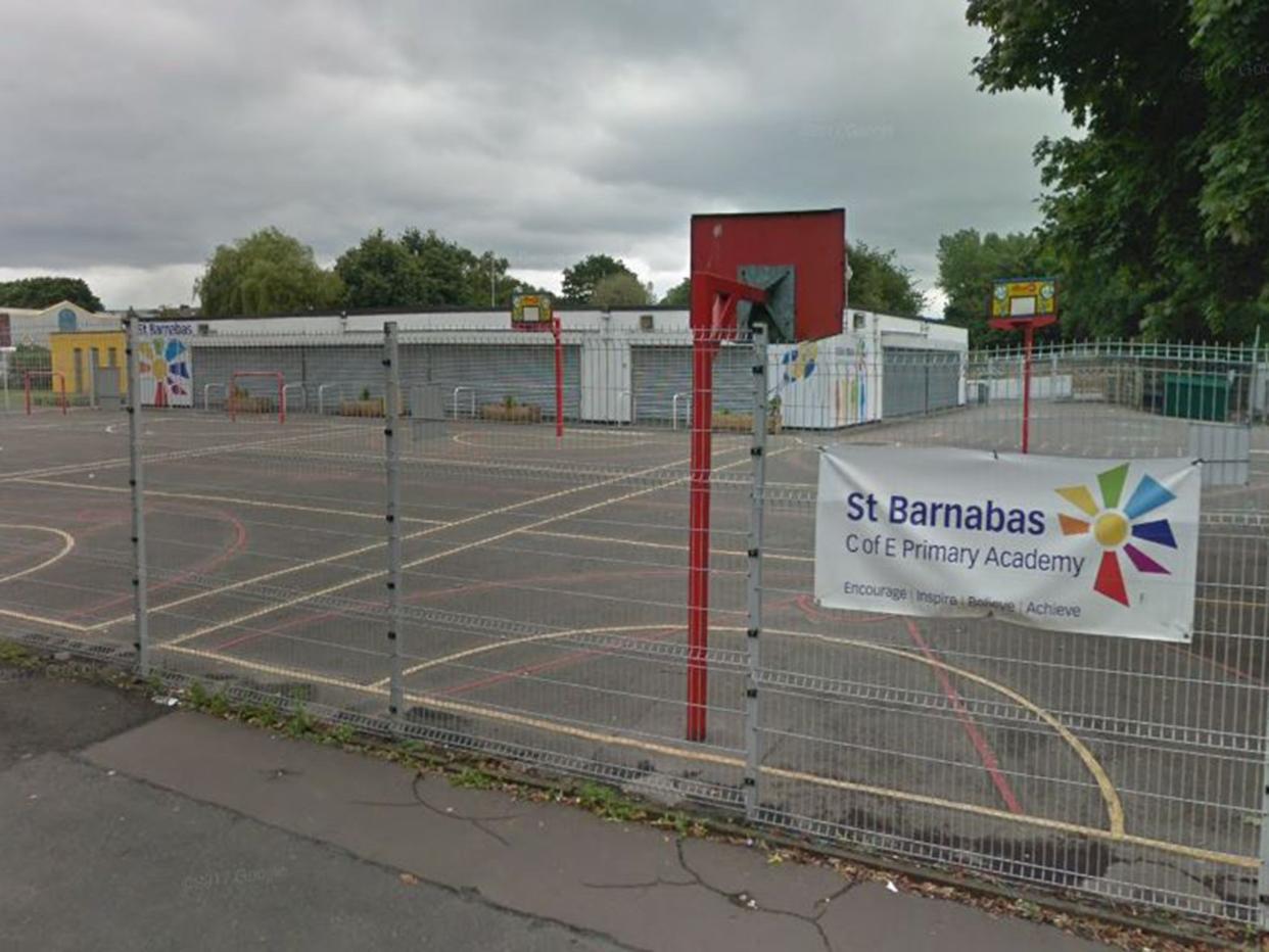 Men attacked car as woman was collecting children from St Barnabas C of E Primary Academy in Openshaw: Google Maps