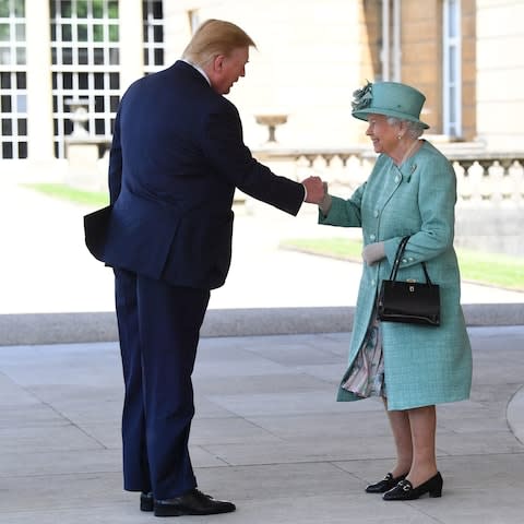 Queen shakes hands warmly with President - Credit: Victoria Jones/PA