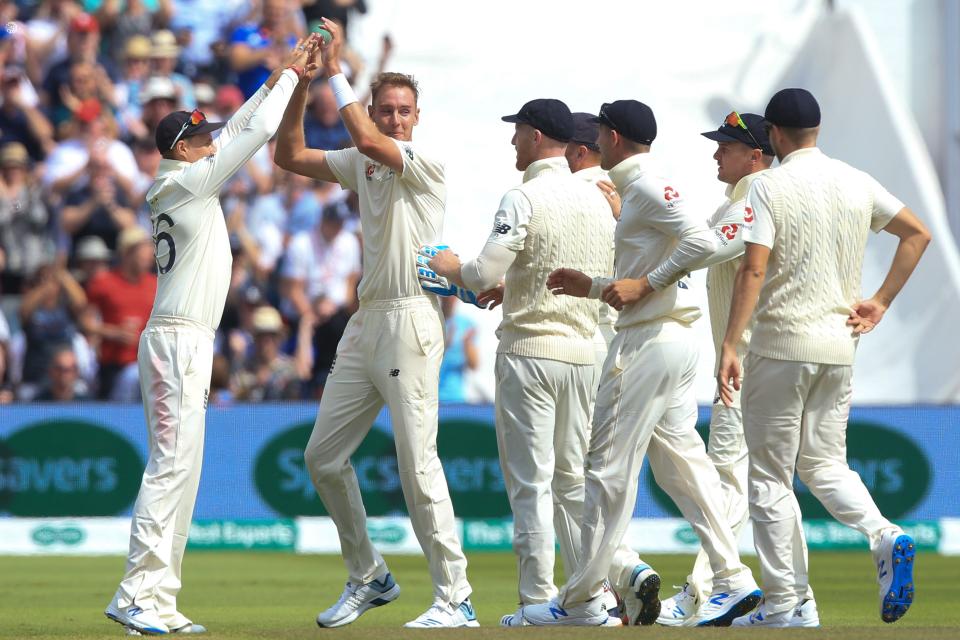 England's Stuart Broad (2L) celebrates with England's captain Joe Root (L) after taking the wicket of Australia's Cameron Bancroft for 8 runs during play on the opening day of the first Ashes cricket Test match between England and Australia at Edgbaston in Birmingham, central England on August 1, 2019. (Photo by Lindsey Parnaby / AFP) / RESTRICTED TO EDITORIAL USE. NO ASSOCIATION WITH DIRECT COMPETITOR OF SPONSOR, PARTNER, OR SUPPLIER OF THE ECB        (Photo credit should read LINDSEY PARNABY/AFP/Getty Images)