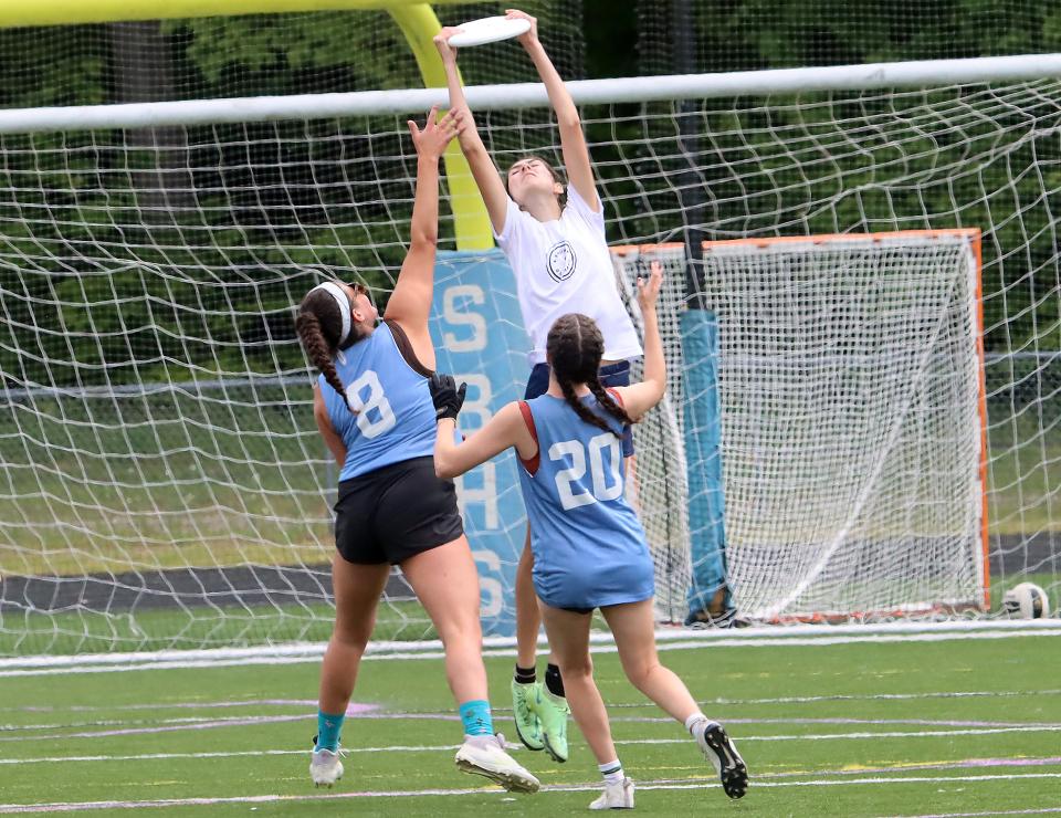 Burlington's Haven Steiner goes up and grabs the disc for a score in the Seahorses 15-6 win over South Burlington in the D1 state championship game on Saturday afternoon at SBHS.