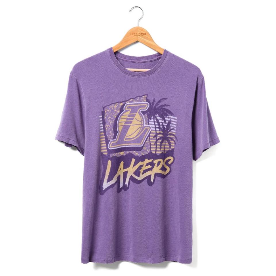 <p><a href="https://go.redirectingat.com?id=74968X1596630&url=https%3A%2F%2Fwww.junkfoodclothing.com%2Fcollections%2Flos-angeles-lakers%2Fproducts%2Flakers-surf-competition-vintage-tee&sref=https%3A%2F%2Fwww.biography.com%2Factors%2Fg43827527%2Fpedro-pascal-vintage-lakers-tee%2F" rel="nofollow noopener" target="_blank" data-ylk="slk:Shop Now;elm:context_link;itc:0;sec:content-canvas" class="link ">Shop Now</a></p><p>Lakers Surf Competition Vintage Tee</p><p>$48.00</p><p>junkfoodclothing.com</p>