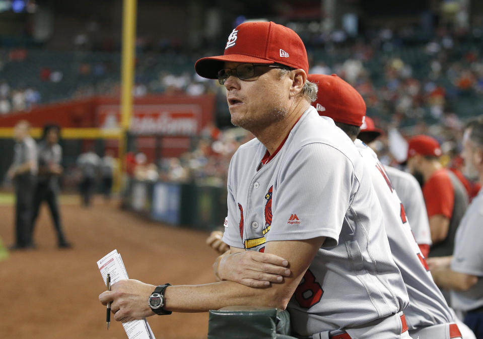 FILE - In this Sept. 25, 2019, file photo, St. Louis Cardinals manager Mike Shildt pauses in the dugout during the fifth inning of the team's baseball game against the Arizona Diamondbacks in Phoenix. Shildt has edged out Craig Counsell of the Milwaukee Brewers to win NL Manager of the Year. (AP Photo/Ross D. Franklin, File)