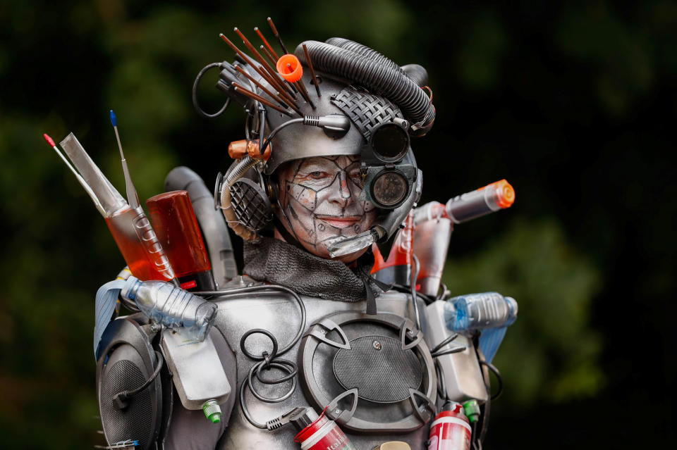 <p>An artist called “The Trashformer” takes part in the festival “Statues en Marche” in Marche-en-Famenne, Belgium, July 22, 2018. (Photo: Yves Herman/Reuters) </p>