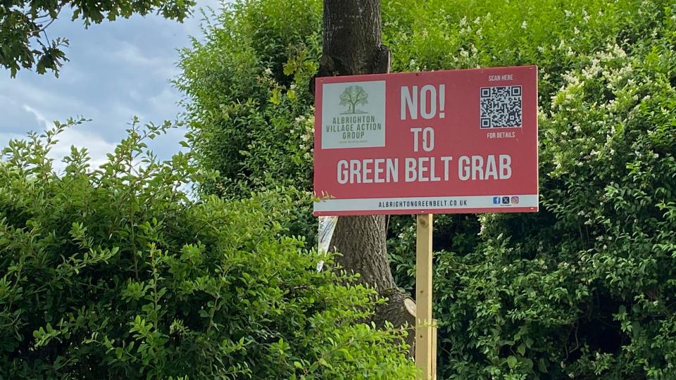 A campaign sign reading "No to green belt grab" in Albrighton