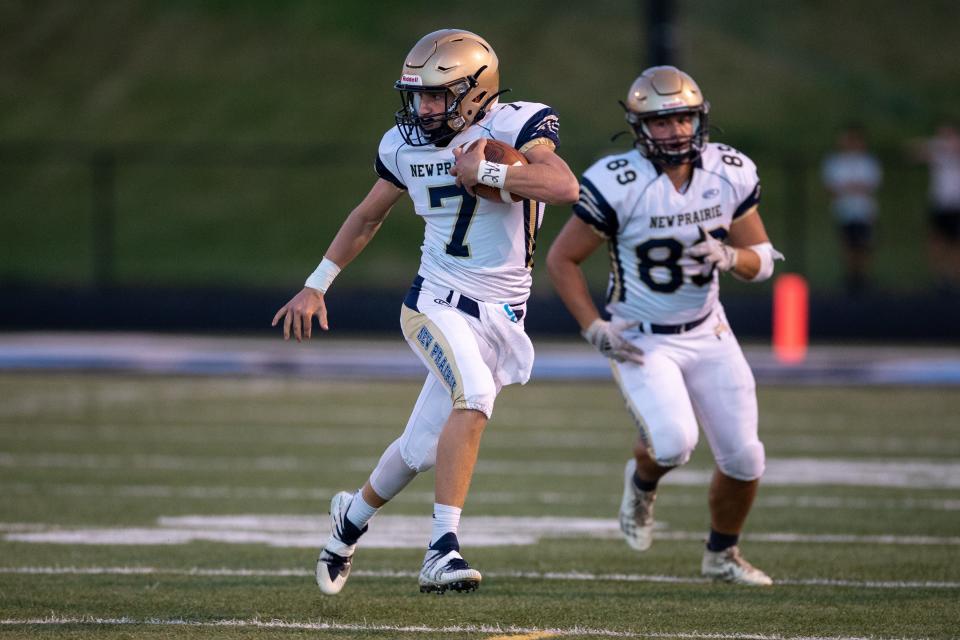 New Prairie's Marshall Kmiecik runs with the ball during the New Prairie-Saint Joseph high school football game on Friday, September 17, 2021, at Father Bly Field in Leighton Stadium in South Bend, Indiana.