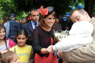 LONDON, ENGLAND - JUNE 03: Princess Eugenie (L) attends the 'Big Jubilee Lunch' at All Saints Church in Fulham ahead of the Diamond Jubilee River Pageant on June 3, 2012 in London, England. For only the second time in its history the UK celebrates the Diamond Jubilee of a monarch. Her Majesty Queen Elizabeth II celebrates the 60th anniversary of her ascension to the throne. Thousands of well-wishers from around the world have flocked to London to witness the spectacle of the weekend's celebrations. The Queen along with all members of the royal family will participate in a River Pageant with a flotilla of a 1,000 boats accompanying them down The Thames. (Photo by Matt Grayson - WPA Pool/Getty Images)