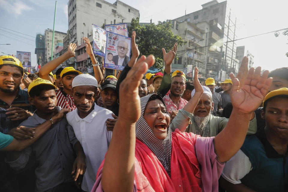 Bangladesh's ruling Awami League supporters shout slogans as they gather for a peace rally in Dhaka, Bangladesh, Friday, July 28, 2023.