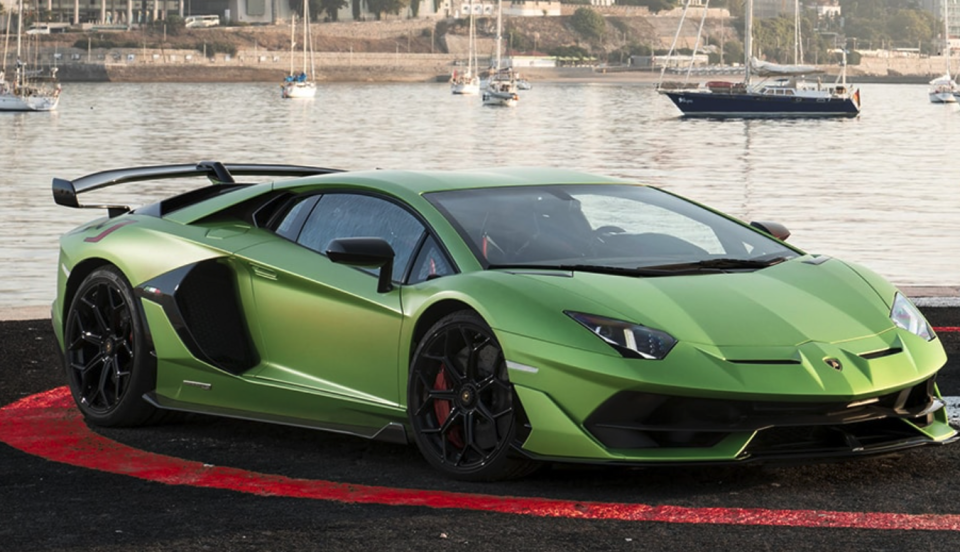 A green Lamborghini Aventador SVJ Coupe. 