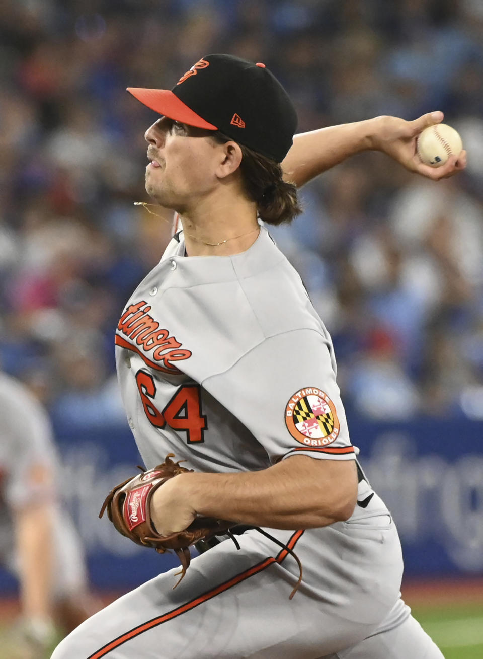 Baltimore Orioles starting pitcher Dean Kremer throws to a Toronto Blue Jays batter in first-inning baseball game action in Toronto, Sunday, Sept. 18, 2022. (Jon Blacker/The Canadian Press via AP)