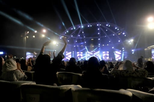 Saudi women attend a concert by Egyptian pop sensation Tamer Hosny in the western city of Jeddah