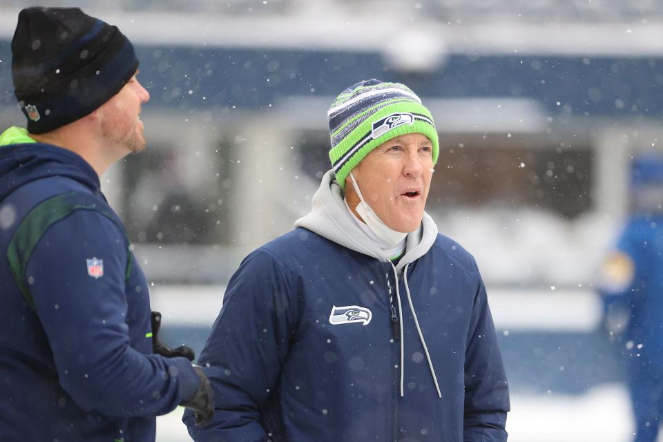 SEATTLE, WASHINGTON - DECEMBER 26: Head coach Pete Carroll of the Seattle Seahawks  looks on during warm-ups before the game against the Chicago Bears at Lumen Field on December 26, 2021 in Seattle, Washington. (Photo by Abbie Parr/Getty Images)