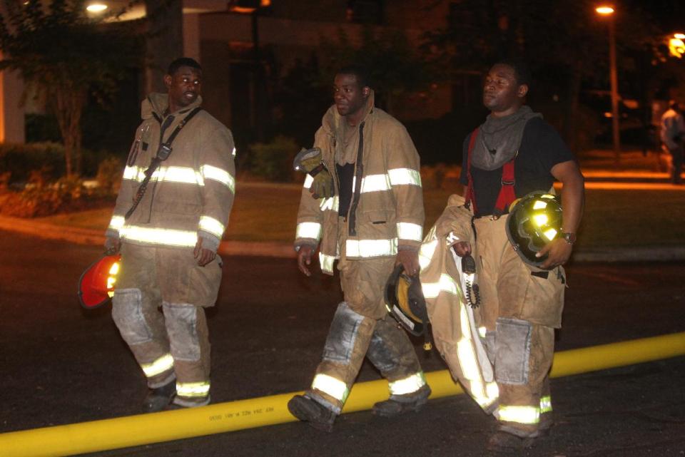 Firefighters respond to a blaze at Tyler Perry Studios in southwest Atlanta, Tuesday night, May 1, 2012. Atlanta fire officials say they have put out the 4-alarm blaze at the studio that damaged a building at the complex. Atlanta Fire Department spokesman Capt. Jolyon Bundrige says the fire happened before 9 p.m. Tuesday and there were no reports of injuries. (AP Photo/Atlanta Journal-Constitution, Curtis Compton)