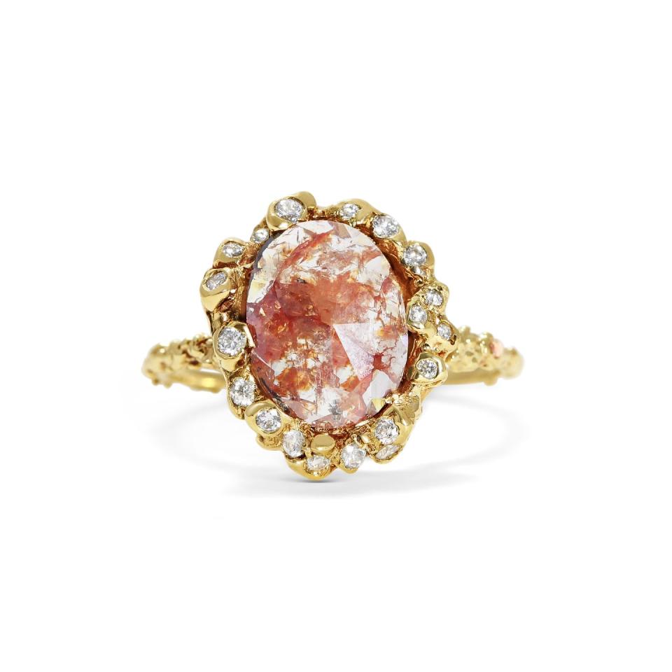 <p>A stunning bespoke ring, inspired by the swirling shapes of natural coral.</p><p>Diamond ring, price on request, Michelle Oh</p><p><a class="link " href="https://www.michelle-oh.com/blogs/commissions/organic-diamond-halo-ring" rel="nofollow noopener" target="_blank" data-ylk="slk:SHOP NOW;elm:context_link;itc:0;sec:content-canvas">SHOP NOW</a></p>