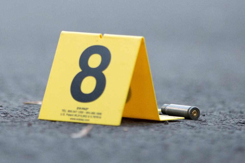 An evidence marker sits next to a rifle casing at the scene of a fatal shooting in the 4500 block of South Hermitage Avenue Monday, Labor Day, Sept. 5, 2016, in the Back of the Yards neighborhood of Chicago. (Photo: Erin Hooley/Chicago Tribune/TNS via Getty Images)