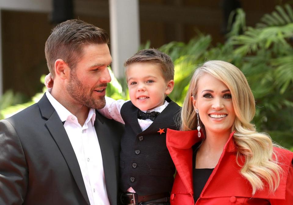 PHOTO: Carrie Underwood with her husband, Mike Fisher and their son, Isaiah Michael Fisher attend the ceremony honoring Carrie Underwood with a Star on The Hollywood Walk of Fam, Sept. 20, 2018, in Hollywood, Calif. (Michael Tran/FilmMagic/Getty Images)