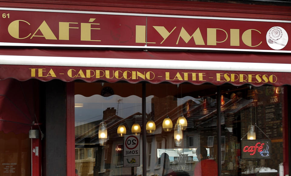 In this Friday, April 27, 2012 photo the facade of the Cafe Lympic is seen in Stratford, east London. One day, the small espresso shop near the site of the London Games was the "Olympic" cafe. The next day, it was the "Lympic." So where did the "O" go? The manager won't say. But it's more than likely the small business became another casualty in the battle against guerrilla marketers _ advertisers who try to associate their products with an event without paying to be sponsors. Protecting the Olympic brand is always a big job, and never more so than this year. Olympic organizers say the increasing sophistication of guerrilla marketers and the rise of social media are putting the five rings under assault in ways barely envisioned a decade ago. (AP Photo/Matt Dunham)