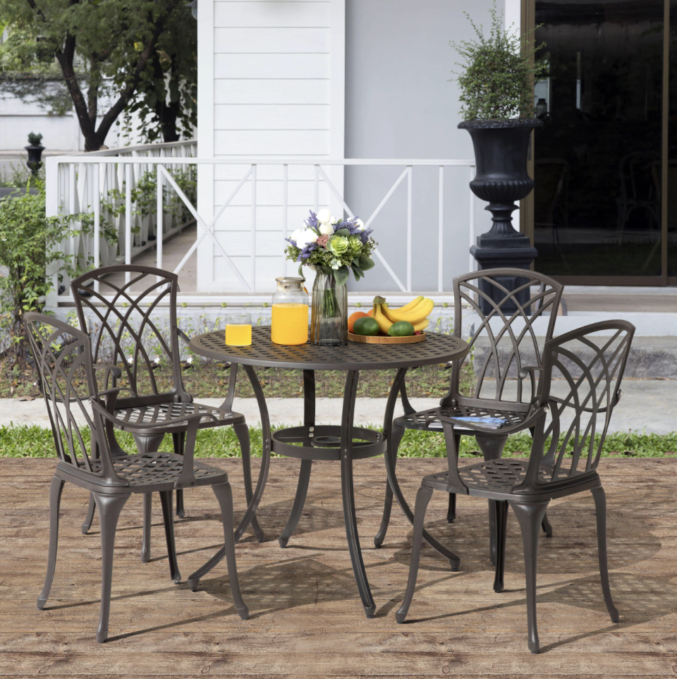 Outdoor bistro table with four chairs