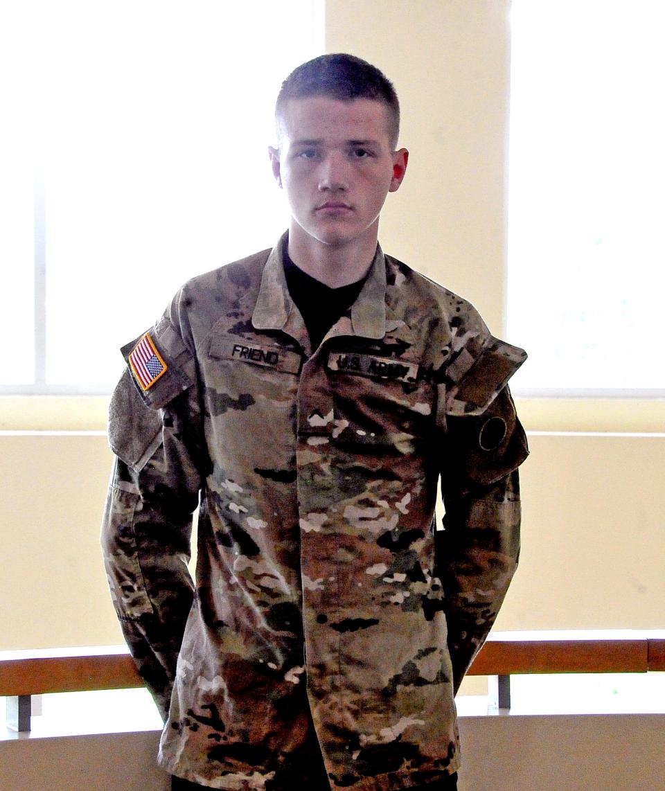 Kenny Hoover poses for a picture in part of his army uniform. Since he has completed boot camp between his junior and senior years of high school, the West Holmes grad will head off to Advanced Individual Training camp this summer where he plans to also complete his associate degree in criminology online.