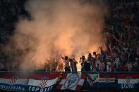 Croatian fans cheer during the Euro 2012 football championships match Ireland vs Croatia at the Municipal Stadium in Poznan. Croatia won 3-1