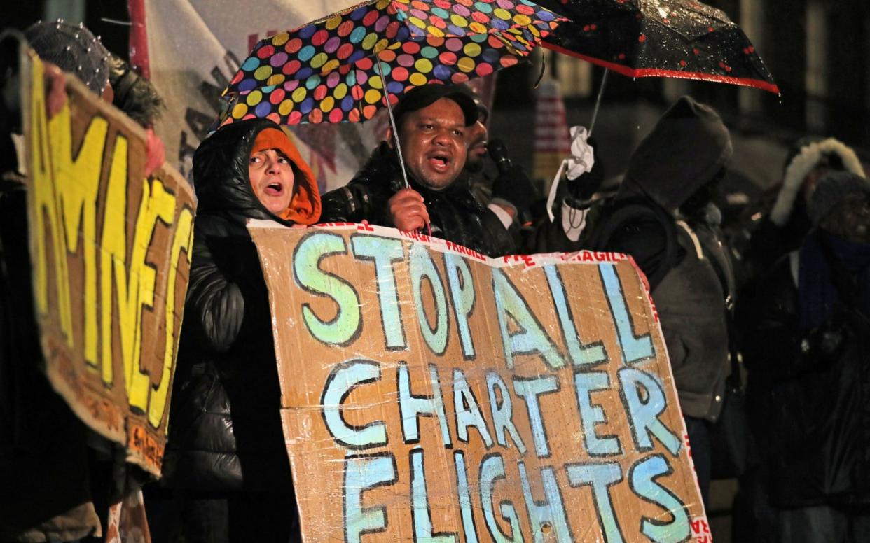 Campaigners outside Downing Street in February 2020 protesting against government plans to deport people to Jamaica - PA