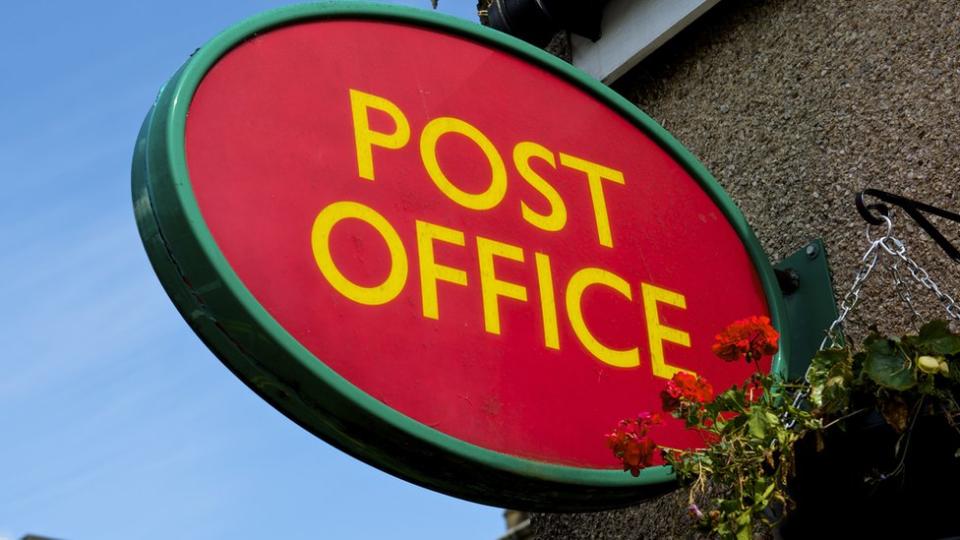 A stock image of a Post Office sign
