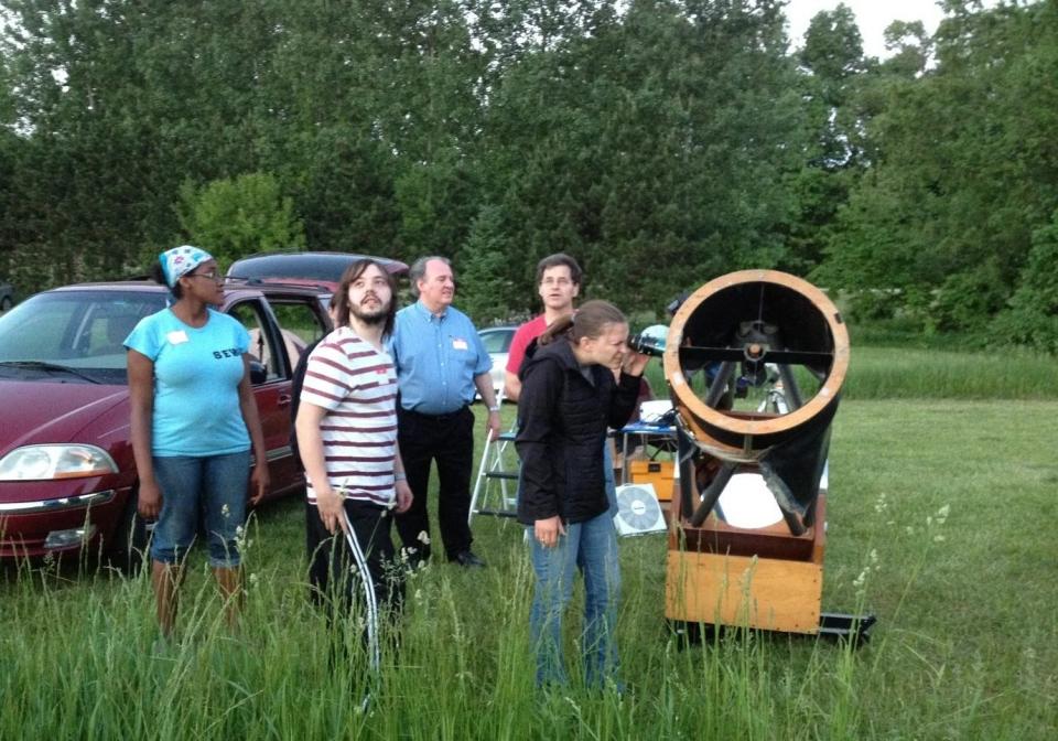 Participants in the Michiana Star Party take turns studying the heavens through telescopes at Dr. T.K. Lawless County Park in Vandalia in a recent year.