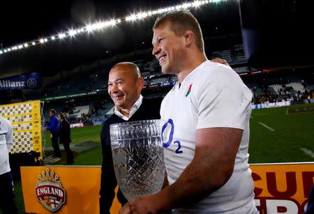 Rugby Union - Rugby Test - England v Australia's Wallabies - Sydney, Australia - 25/06/16. England's head coach Eddie Jones stands with captain Dylan Hartley as he holds the Cook Cup trophy after defeating Australia. REUTERS/David Gray