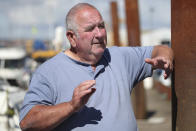 Fisherman Stan Rennie is pictured by his fishing vessel in Hartlepool, England, Thursday June. 27, 2024. A lot of politicians have promised change to voters in Hartlepool, a wind-whipped port town in northeast England. “At the last election I voted Conservative because Johnson promised our waters back — and lied through his teeth,” said Stan Rennie, a fisherman who has caught lobster off Hartlepool for five decades but says he can scarcely scrape a living anymore. (AP Photo/Scott Heppell)