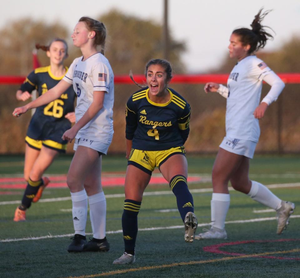 Spencerport's Lindsay Lenhard screams in celebration after scoring against Webster Schroeder during their Section V Class AA girls soccer final Saturday, Oct. 28, 2023 at Canandaigua Academy. Spencerport won the title with a 3-0 win. Lenhard scored two of the goals for the Rangers.