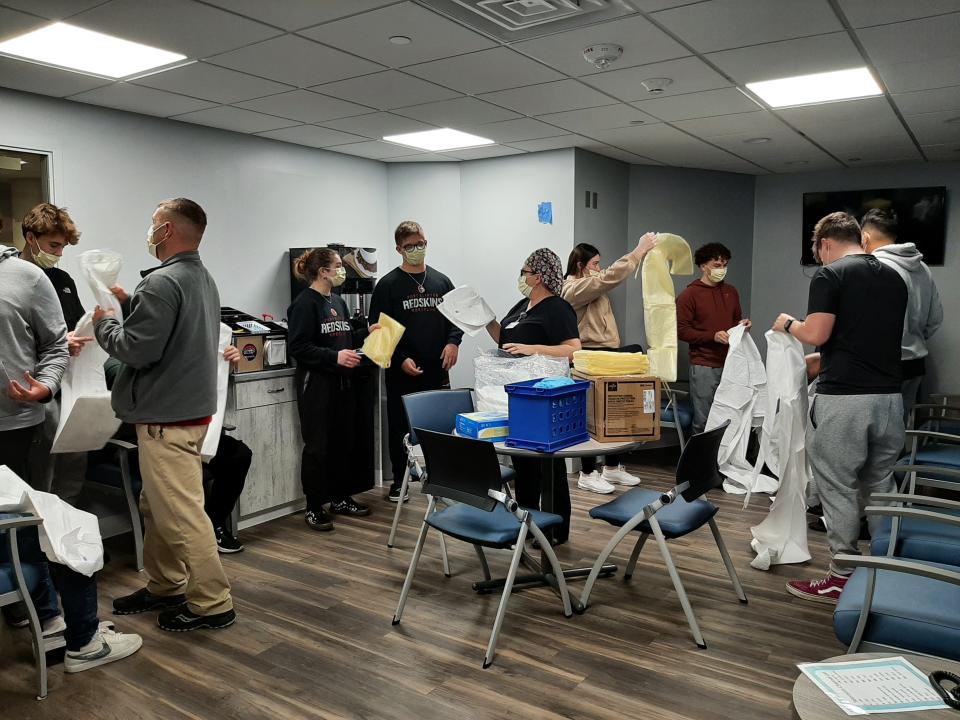 Students from Port Clinton High School rob up to tour Magruder Hospital's Surgery Department.