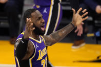 Los Angeles Lakers forward LeBron James complains about the lack of a foul call during the first half of the team's NBA basketball game against the Memphis Grizzlies on Friday, Feb. 12, 2021, in Los Angeles. (AP Photo/Mark J. Terrill)