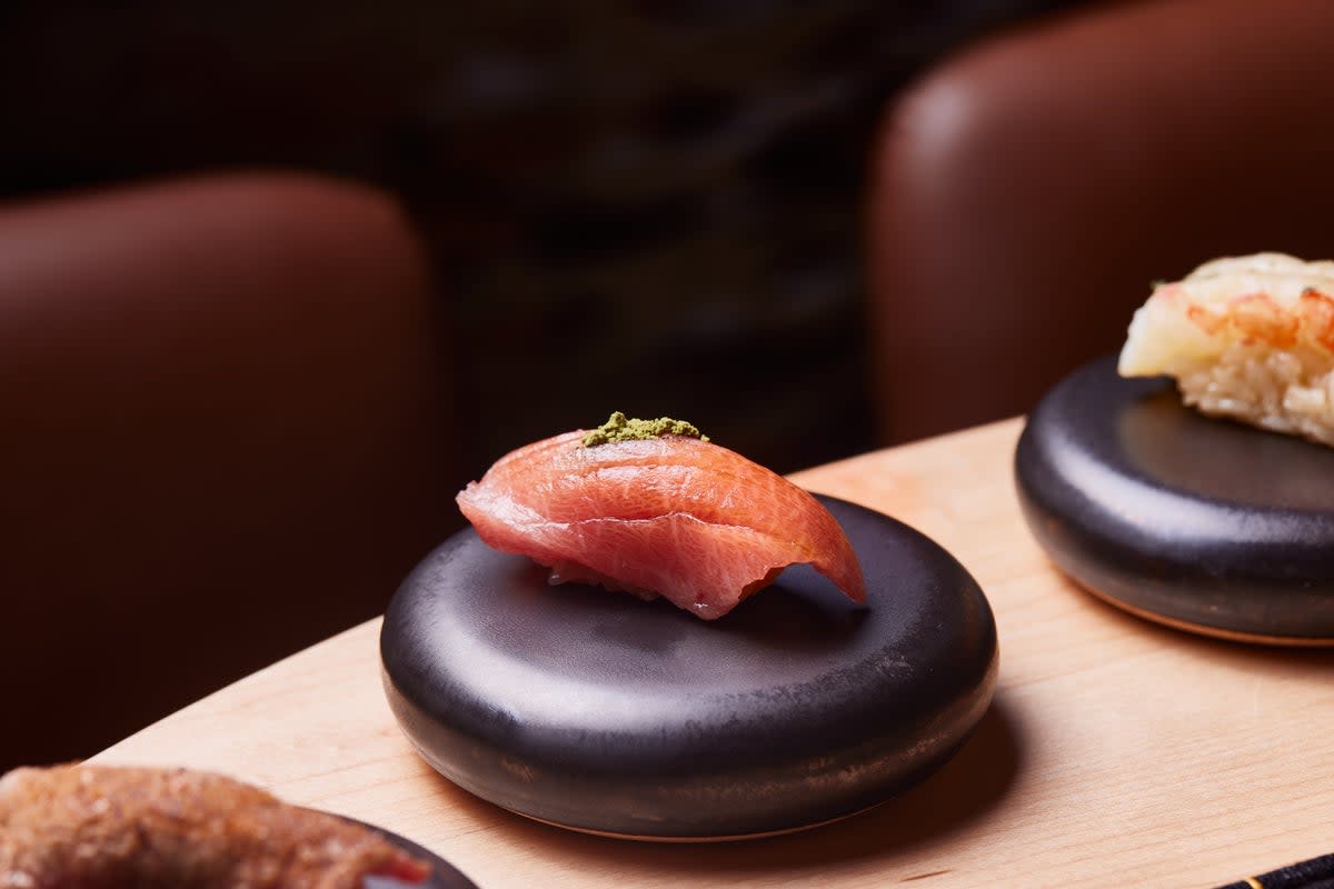 At Juno, Chef Trang uses ground insects as a garnish on nigiri (Juno)