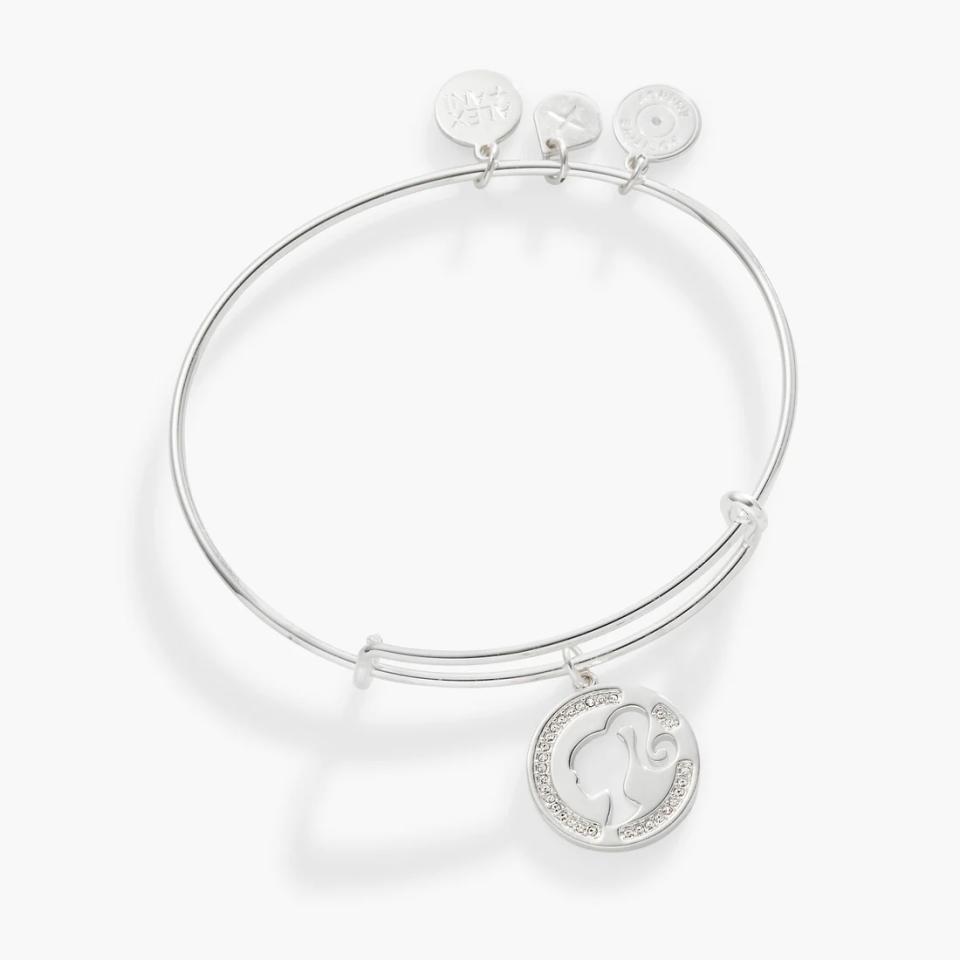 silver bangle with Barbie logo charm