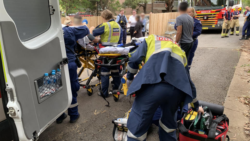 The man is seen being treated by paramedics. Source: Careflight