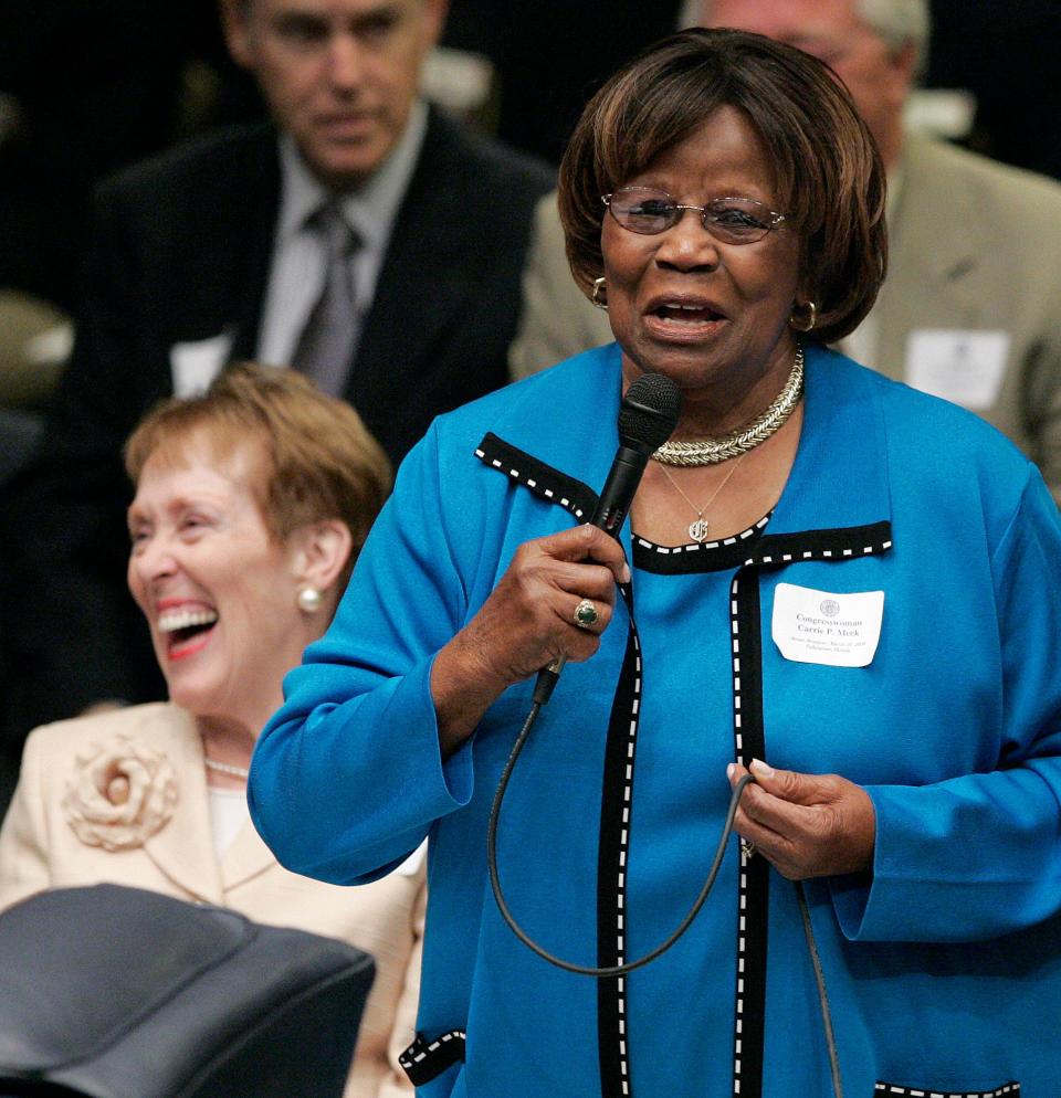 Former Florida Congresswoman Carrie Meek cracks up Betty Castor, left as she recalls her time serving in the legislature on senate reunion day, March 20, 2008 in Tallahassee, Fla. Meek, the grandchild of a slave and a sharecropperâ€™s daughter who became one of the first black Floridians elected to Congress since Reconstruction, died Sunday, Nov. 28, 2021. She was 95.