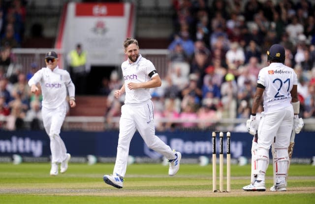 Chris Woakes celebrates dismissing Sri Lanka’s Kamindu Mendis at Old Trafford