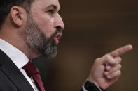 Vox party leader Santiago Abascal points while making a speech during a parliamentary session in Madrid, Spain, Wednesday Oct. 21, 2020. Spanish Prime Minister Pedro Sanchez faces a no confidence vote in Parliament put forth by the far right opposition party VOX. (AP Photo/Manu Fernandez, Pool)