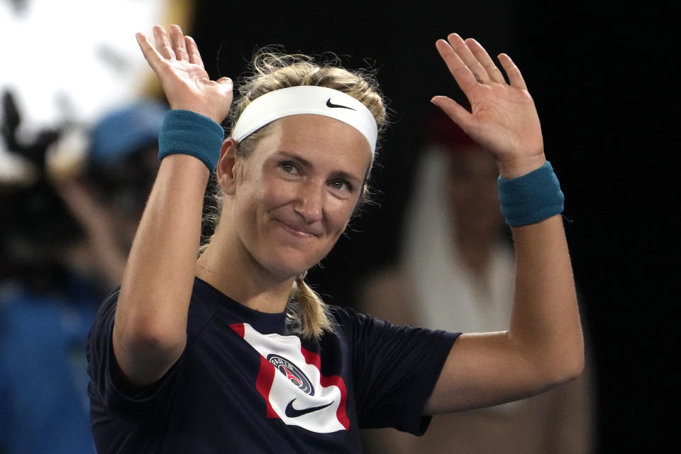 Victoria Azarenka of Belarus waves after defeating Jessica Pegula of the U.S. in their quarterfinal match at the Australian Open tennis championship in Melbourne, Australia, Tuesday, Jan. 24, 2023 (AP Photo/Ng Han Guan)