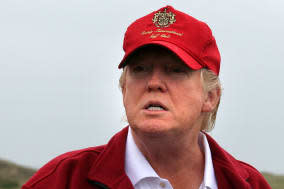 File photo dated 09/07/12 of Donald Trump who has lost a legal challenge to an offshore wind farm project within sight of his Scottish golf resort. PRESS ASSOCIATION Photo. Issue date: Tuesday February 11, 2014. The businessman's legal team went to court in November to oppose the 11-turbine European Offshore Wind Deployment Centre (EOWDC) off the Aberdeenshire coast, claiming it would spoil the view from his luxury golf course. See PA story COURTS Trump. Photo credit should read: Andrew Milligan/PA Wire