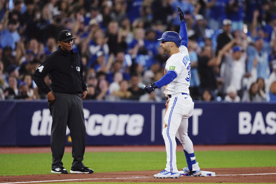 Toronto Blue Jays' Kevin Kiermaier celebrates after hitting a triple against the Kansas City Royals during the sixth inning of a baseball game Friday, Sept. 8, 2023, in Toronto. (Nathan Denette/The Canadian Press via AP)