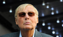 <p>Actor Adam West poses for photographers at a ceremony where he received a star on the Hollywood Walk of Fame in Los Angeles, Calif., April 5, 2012. (Photo: Phil McCarten/Reuters) </p>