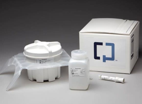 A Cologuard kit, including a shipping box and specimen containers.