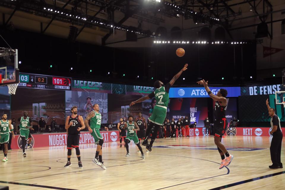 OG Anunoby of the Toronto Raptors shoots a game-winning basket against the Boston Celtics in Orlando, September 3, 2020.
