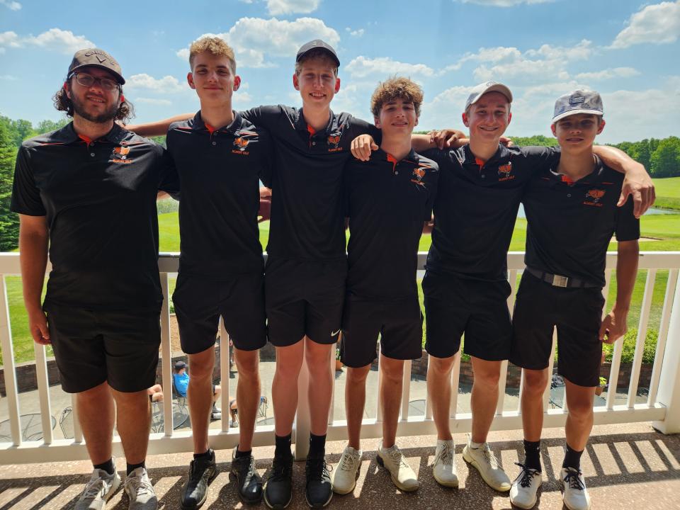 The Almont boys golf team poses for a photo after a Division 3 regional at Hawk Hollow Golf Course in Bath on Tuesday. The Raiders qualified for the state finals with a third-place finish.