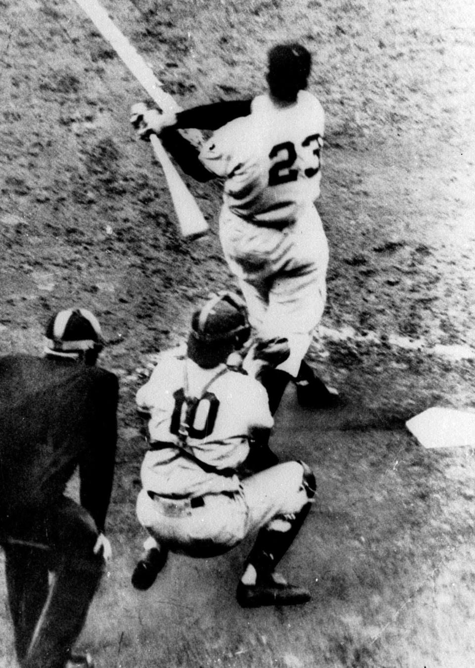 Bobby Thomson of the New York Giants hits a pennant-winning, three-run home run for a 5-4 win in the ninth inning against the Brooklyn Dodgers at the Polo Grounds in New York City in this Oct. 3, 1951, file photo.