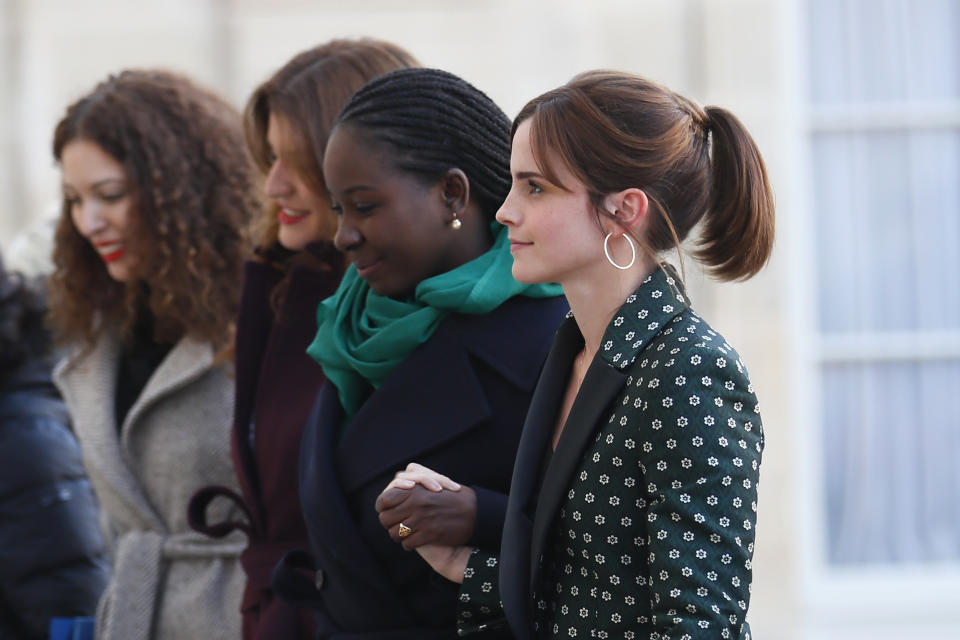 Actress Emma Watson, right, arrives with other women at the Elysee Palace for a meeting on gender equality ahead of the upcoming G7, Tuesday, Feb.19, 2019 at the Elysee Palace in Paris. (AP Photo/Francois Mori)