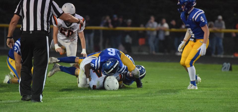 Canton sophomore Kieshon Smith tackles a Lennox player during the C-Hawks 28-20 win on Friday, Sep. 8.