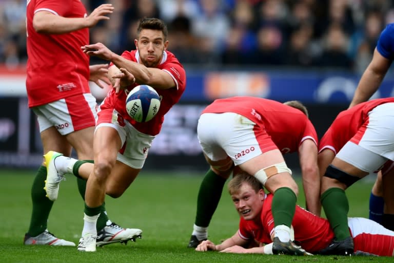 Rhys Webb (L) made the last of his 40 <a class="link " href="https://sports.yahoo.com/soccer/teams/wales/" data-i13n="sec:content-canvas;subsec:anchor_text;elm:context_link" data-ylk="slk:Wales;sec:content-canvas;subsec:anchor_text;elm:context_link;itc:0">Wales</a> appearances in March 2023 (FRANCK FIFE)